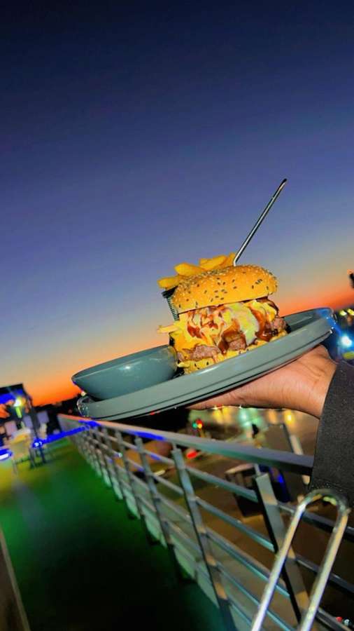 Loaded burger sunset sky