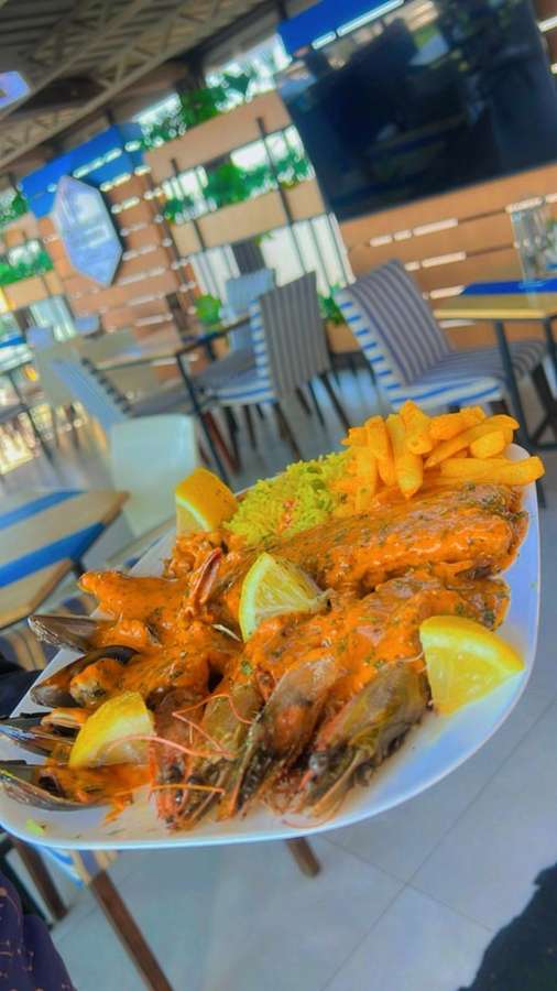 Seafood platter with rice and fries