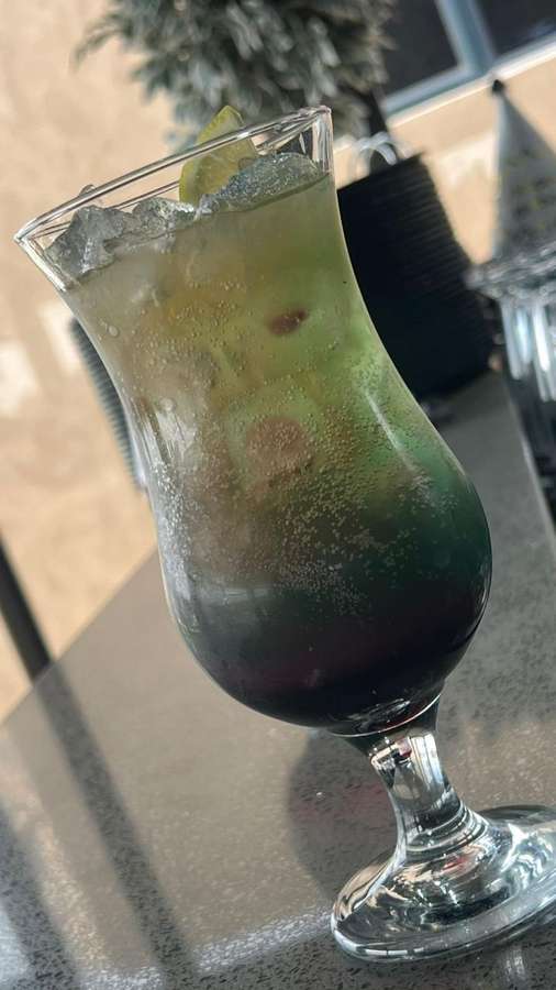 Galaxy green layered mocktail