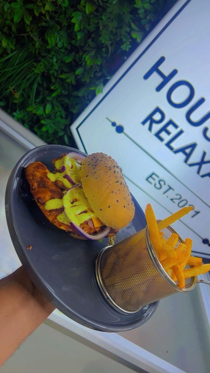 Burger with green wall sign