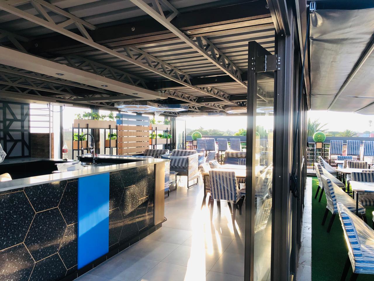 Indoor rooftop bar area daytime