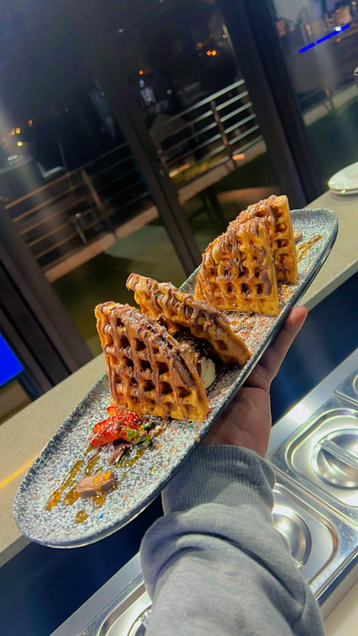 Gourmet waffles with Nutella and sprinkles