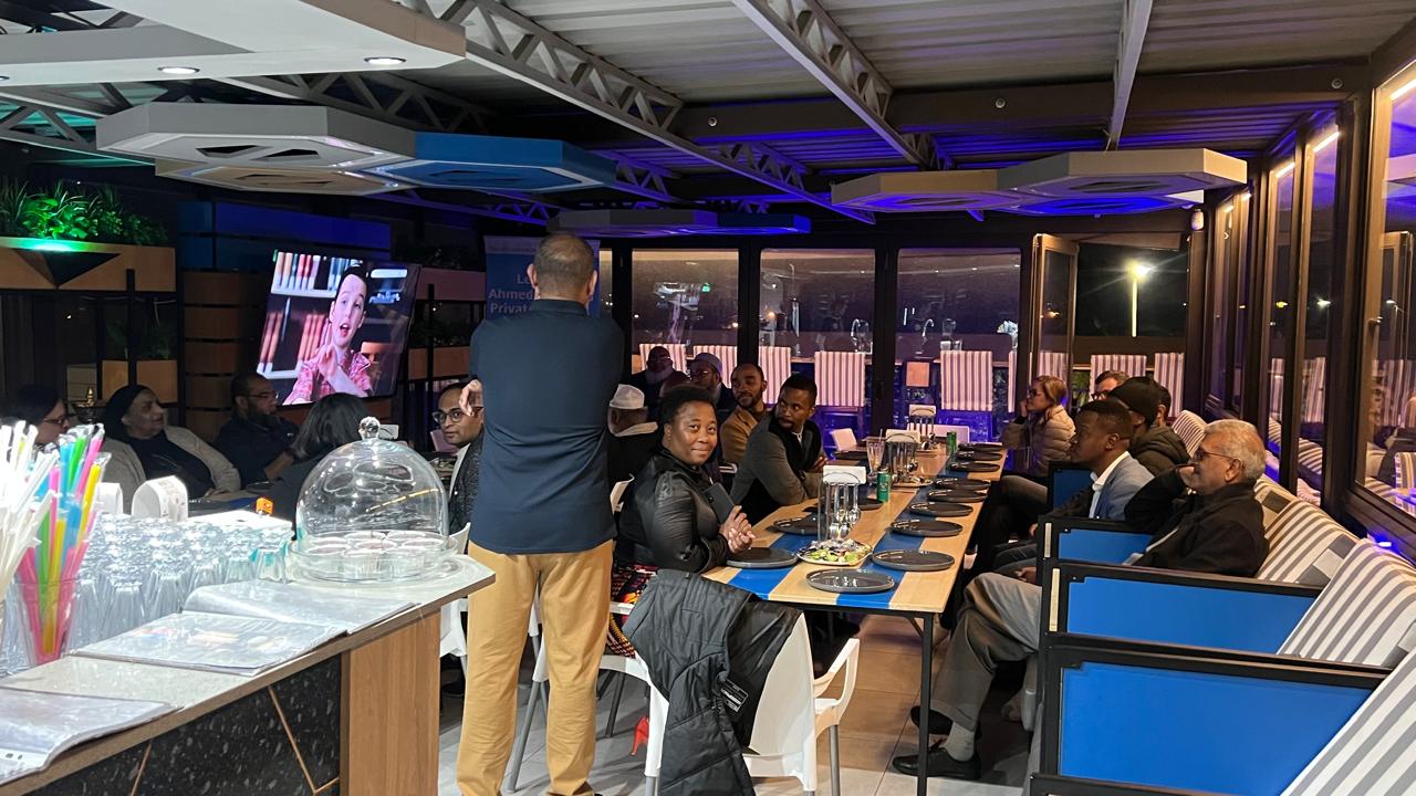 Corporate dinner with projector screen