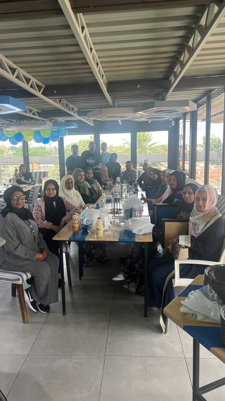 Group gathering — birthday balloons