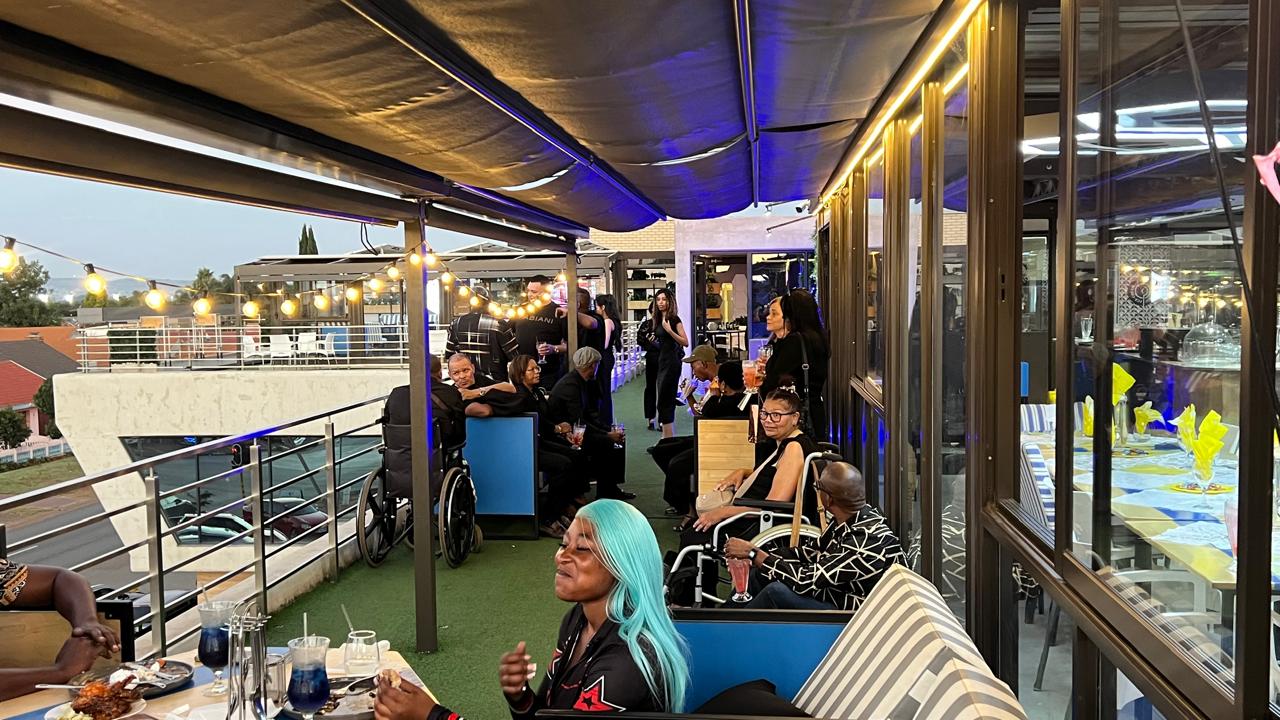 Rooftop terrace evening guests