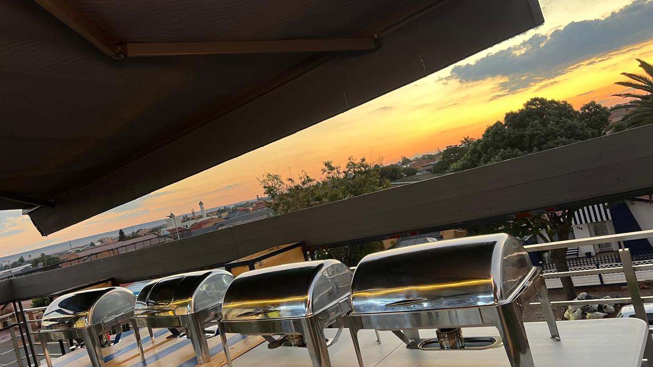 Buffet chafing dishes sunset view