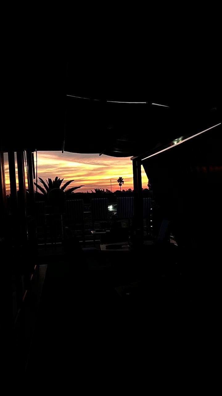 Rooftop sunset silhouette