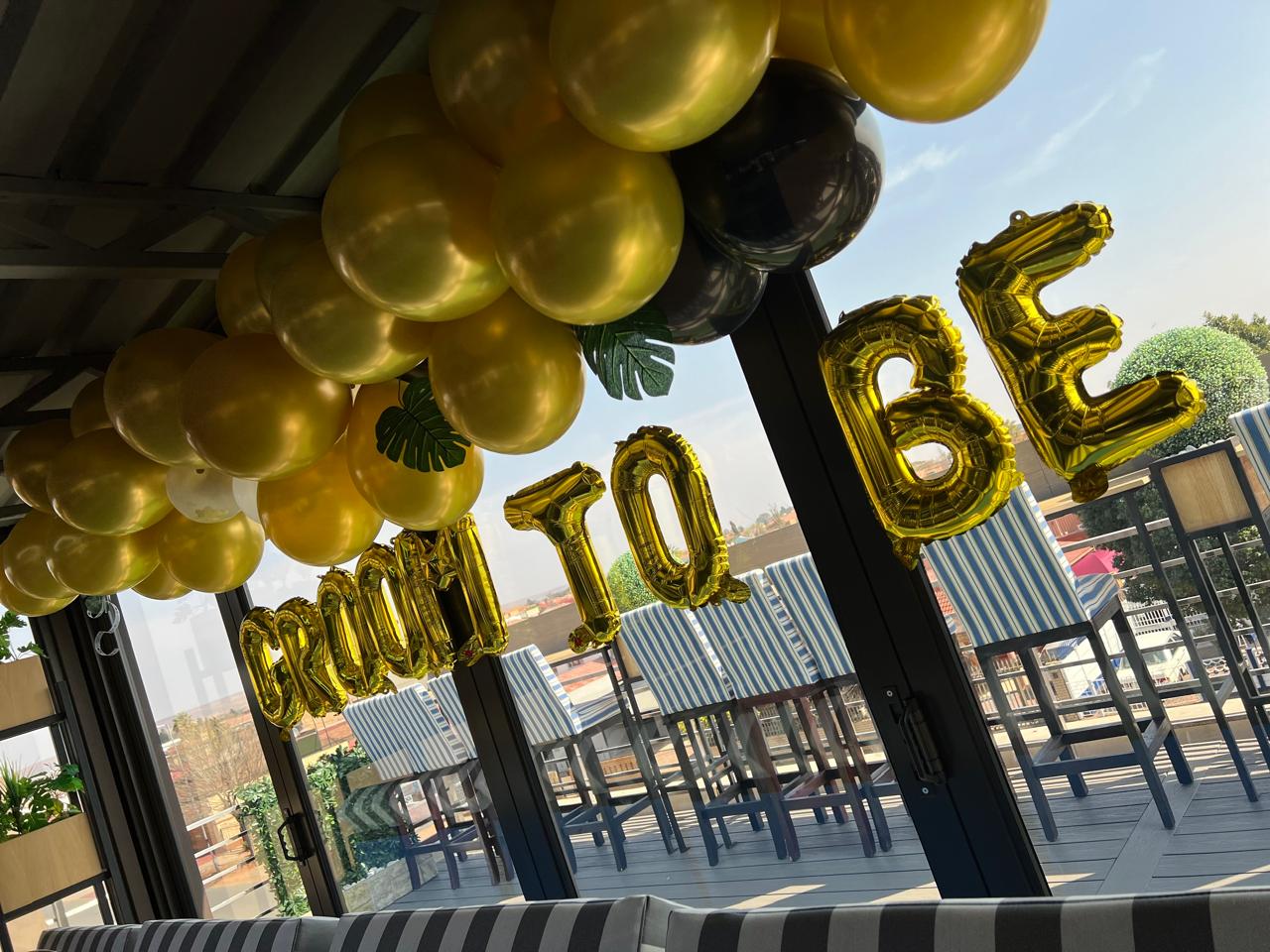 Groom to Be balloon arch from outside