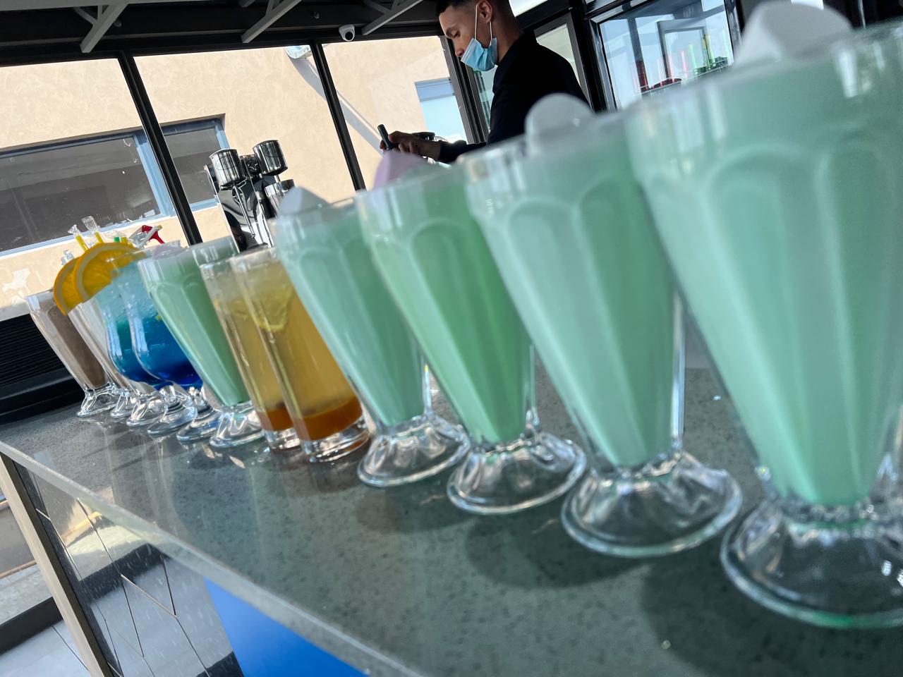 Milkshakes and mocktails lined up daytime