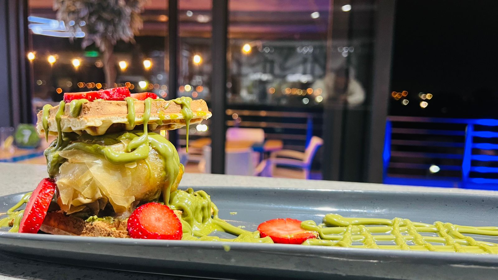Waffles with sparklers on a tray